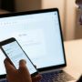 User recovering deleted Snapchat conversations using phone settings and backup tools on a smartphone screen