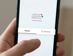 User removing reposted video on TikTok app from smartphone settings