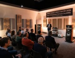 Visitors listening to high fidelity speakers in a calibrated demonstration room at the Paris Audio Video Show 2026 inside the Palais des Congrès de Paris